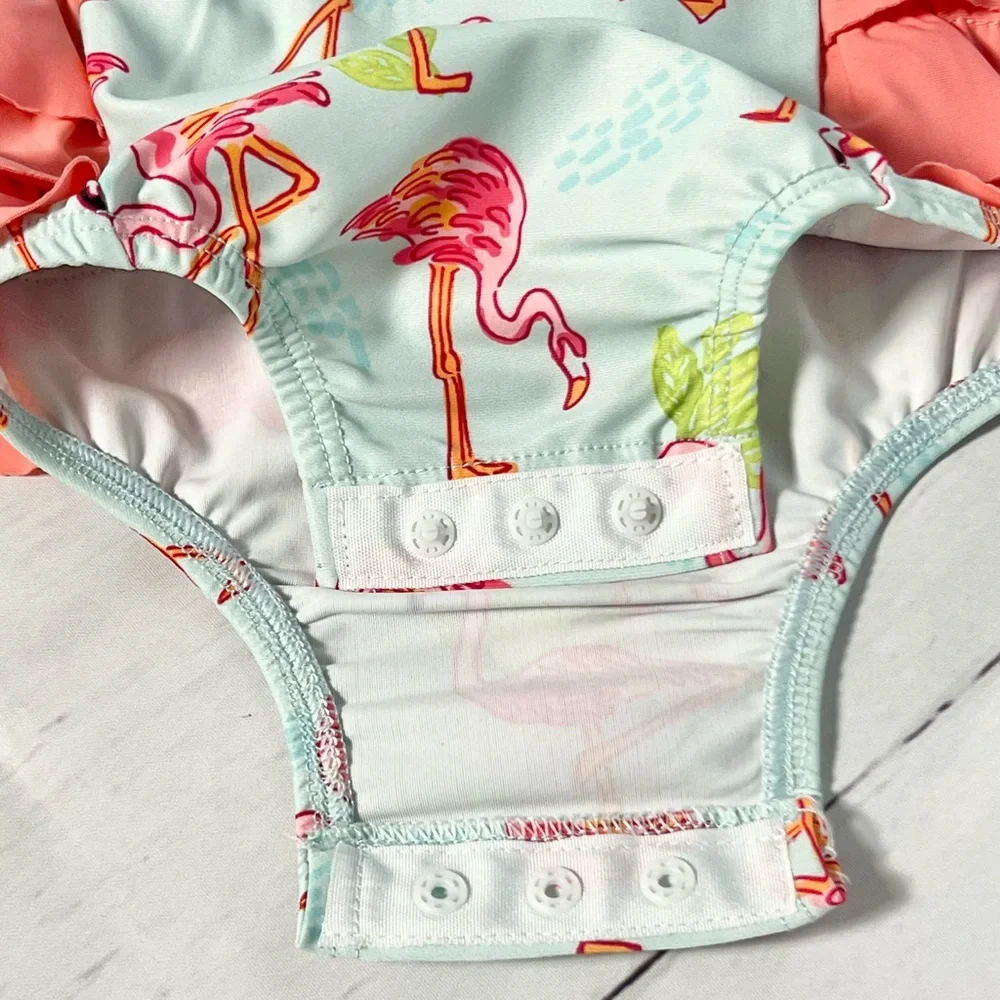 Mud Pie Baby Girls Flamingo One-Piece Rash Guard Swimsuit with Ruffle Butt
